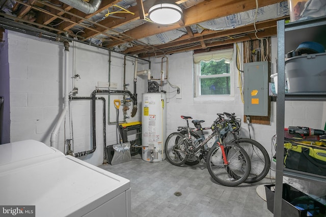 6001 Kroy Ct, Springfield, VA 22150 - below grade area with separate washer and dryer, gas water heater, electric panel, and concrete block wall