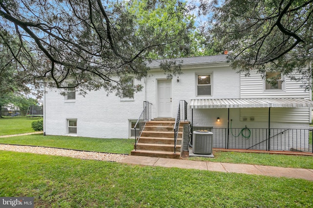 6001 Kroy Ct, Springfield, VA 22150 - view of front of property featuring brick siding, a front lawn, and entry steps