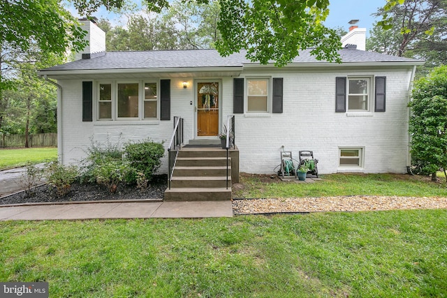 6001 Kroy Ct, Springfield, VA 22150 - view of front of house with a chimney, brick siding, and a shingled roof