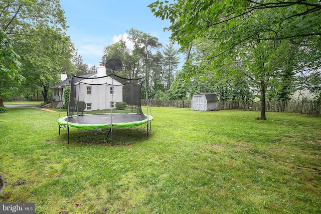 6001 Kroy Ct, Springfield, VA 22150 - fenced backyard featuring a trampoline and a storage shed