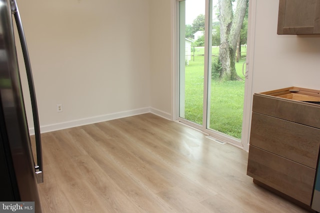803 Grafton St, Fredericksburg, VA 22405 - unfurnished dining area featuring light wood-type flooring and baseboards