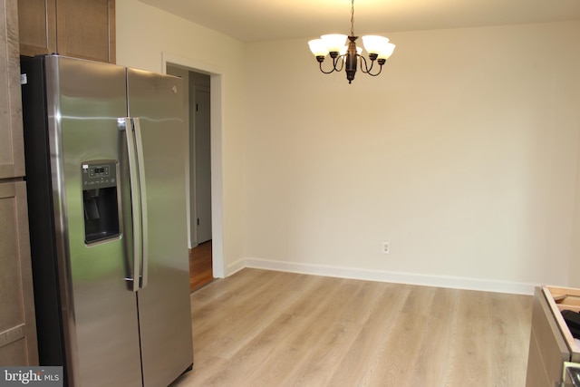 803 Grafton St, Fredericksburg, VA 22405 - kitchen featuring stainless steel fridge, a chandelier, light wood-type flooring, and hanging light fixtures