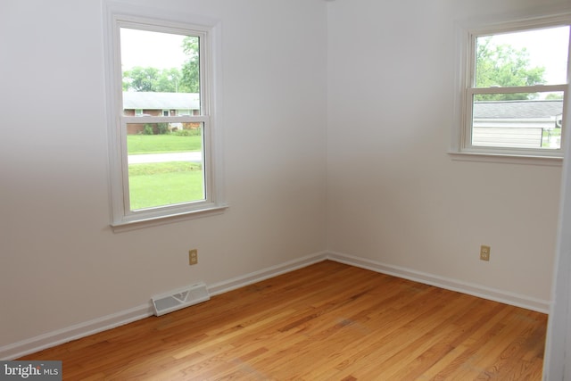 803 Grafton St, Fredericksburg, VA 22405 - empty room with light wood-type flooring and healthy amount of natural light