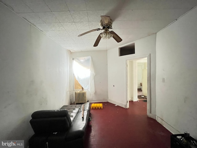 4728 York Rd, Baltimore, MD 21212 - sitting room with radiator heating unit and ceiling fan
