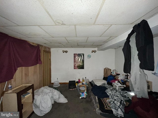 4728 York Rd, Baltimore, MD 21212 - bedroom with a drop ceiling, wooden walls, and carpet flooring