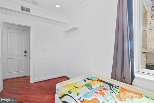 1832 Calvert St NW Unit 3, Washington, DC 20009 - bedroom with crown molding, wood finished floors, and baseboards