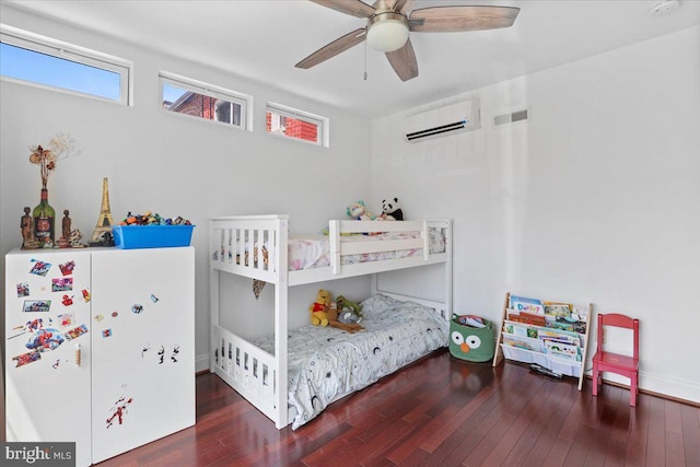 1832 Calvert St NW Unit 3, Washington, DC 20009 - bedroom featuring an AC wall unit, hardwood / wood-style flooring, and a ceiling fan