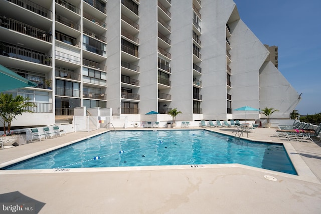 9500 Coastal Hwy Unit 1L, Ocean City, MD 21842 - community pool featuring a patio area