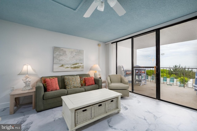 9500 Coastal Hwy Unit 1L, Ocean City, MD 21842 - living room with marble finish floors and a ceiling fan
