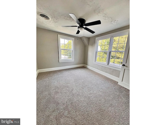 1045 S Bradford St, Dover, DE 19904 - carpeted spare room with baseboards and ceiling fan