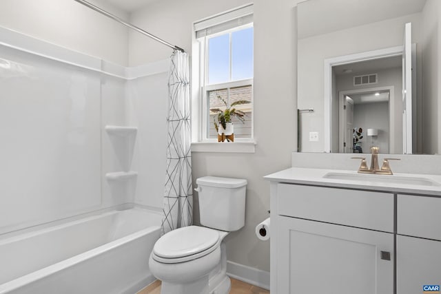 820 Swede St, Charlottesville, VA 22901 - bathroom with vanity, baseboards, toilet, and shower / tub combo