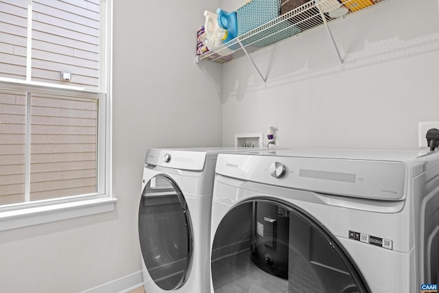 820 Swede St, Charlottesville, VA 22901 - laundry area featuring washer and dryer, baseboards, and tile patterned floors