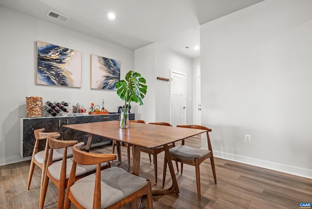 820 Swede St, Charlottesville, VA 22901 - dining area with baseboards, wood finished floors, and recessed lighting