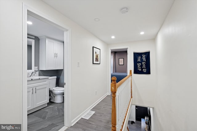 2174 E Oakdale St, Philadelphia, PA 19125 - hallway with recessed lighting and an upstairs landing
