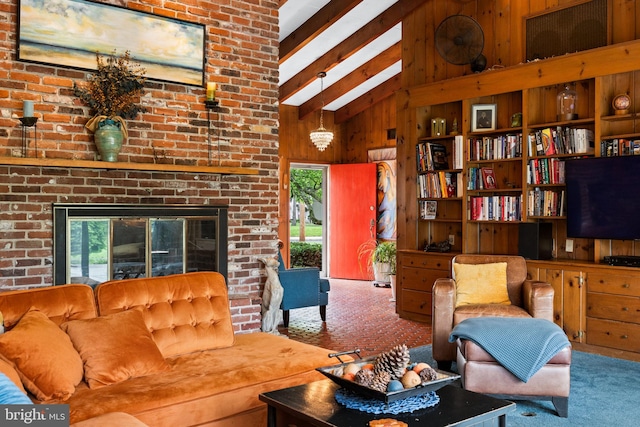 320 S Main St, Quakertown, PA 18951 - carpeted living area featuring healthy amount of natural light, wood walls, high vaulted ceiling, beam ceiling, and a fireplace
