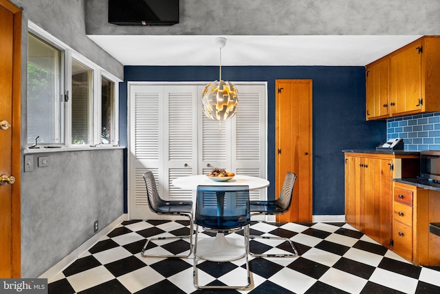 320 S Main St, Quakertown, PA 18951 - dining room featuring tile patterned floors and a chandelier