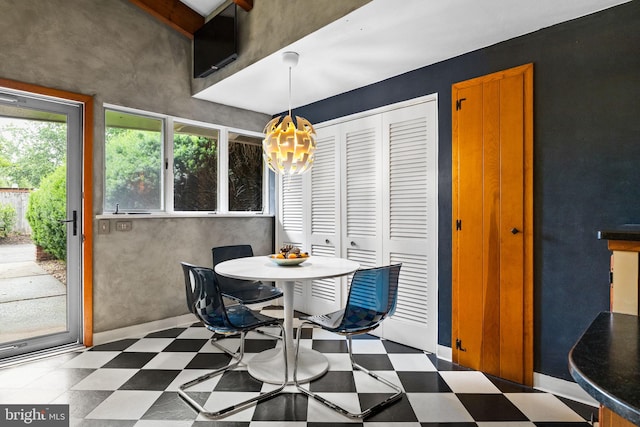 320 S Main St, Quakertown, PA 18951 - dining space featuring tile patterned floors and a chandelier
