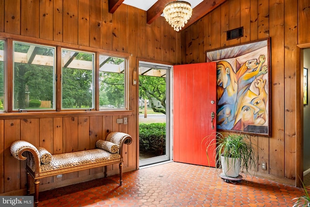 320 S Main St, Quakertown, PA 18951 - foyer entrance with wooden walls, beamed ceiling, and a chandelier
