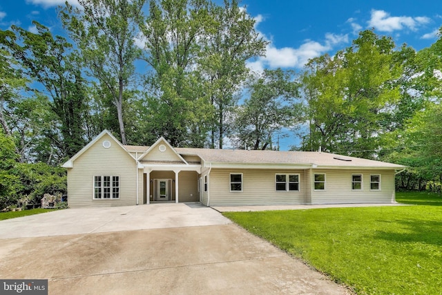 3603 John Ct, Annandale, VA 22003 - ranch-style house with concrete driveway, a front yard, and view of scattered trees