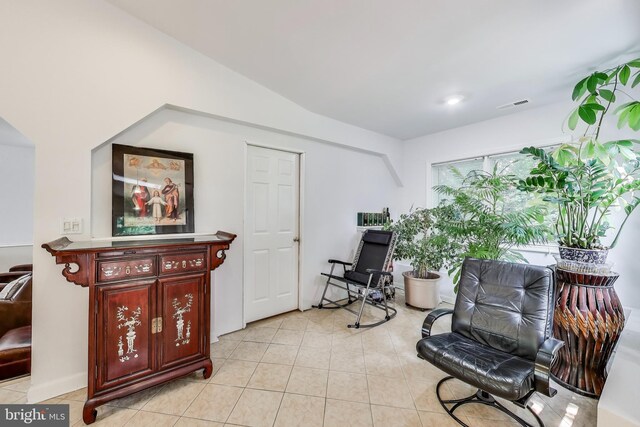 3603 John Ct, Annandale, VA 22003 - sitting room featuring light tile patterned floors and vaulted ceiling