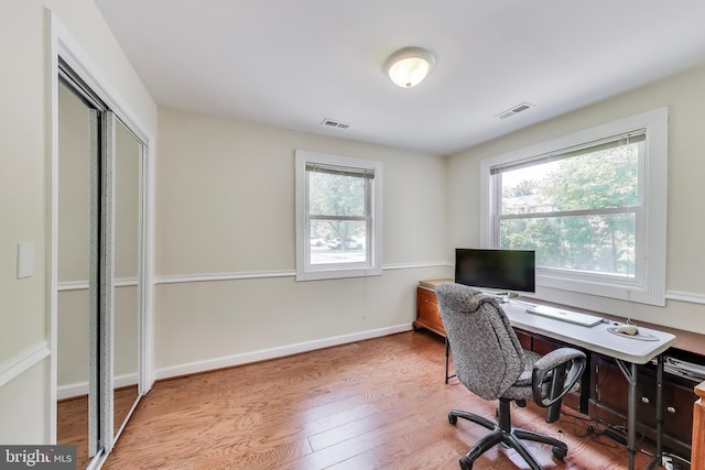 3603 John Ct, Annandale, VA 22003 - home office featuring plenty of natural light, wood finished floors, and baseboards
