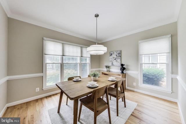 2177 S Glebe Rd, Arlington, VA 22204 - dining area featuring light wood-type flooring, crown molding, and baseboards