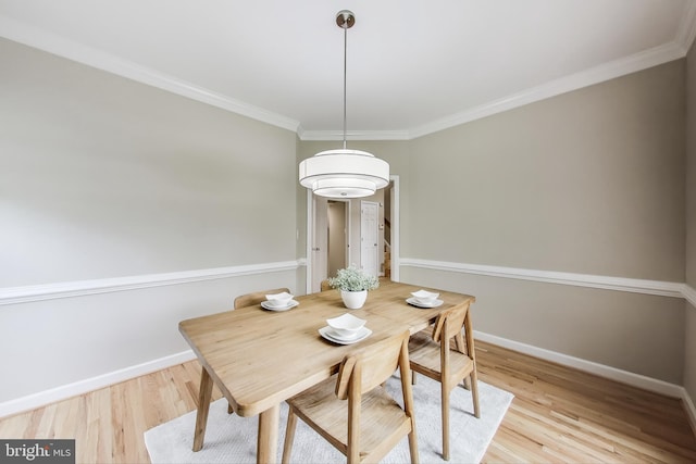 2177 S Glebe Rd, Arlington, VA 22204 - dining room with baseboards, ornamental molding, and wood finished floors