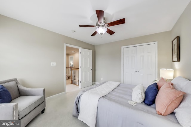 2177 S Glebe Rd, Arlington, VA 22204 - bedroom with a closet, light colored carpet, baseboards, and a ceiling fan