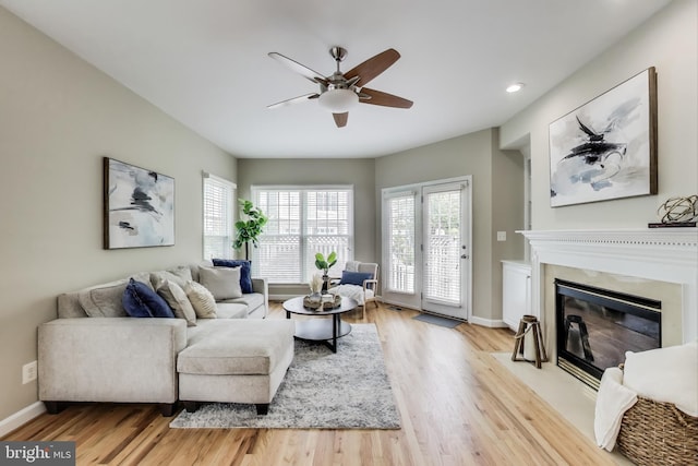 2177 S Glebe Rd, Arlington, VA 22204 - living area with ceiling fan, wood finished floors, a fireplace with flush hearth, baseboards, and recessed lighting