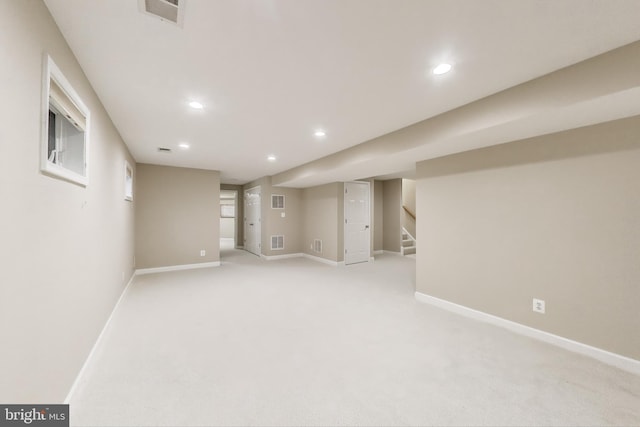 2177 S Glebe Rd, Arlington, VA 22204 - finished below grade area with recessed lighting, baseboards, stairway, and light carpet
