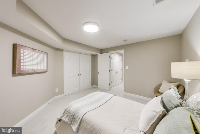 2177 S Glebe Rd, Arlington, VA 22204 - bedroom featuring baseboards, light colored carpet, and a closet