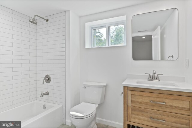 418 Belton Ct, Silver Spring, MD 20901 - bathroom featuring vanity, toilet, bathing tub / shower combination, and baseboards