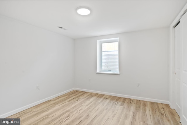 418 Belton Ct, Silver Spring, MD 20901 - unfurnished bedroom with a closet, wood finished floors, and baseboards