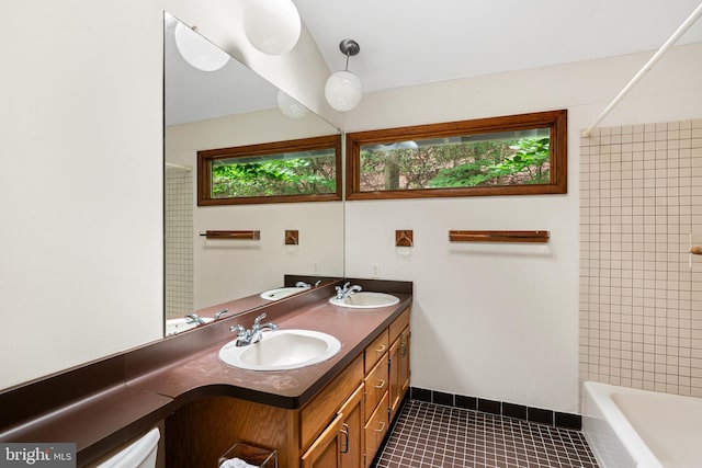 475 Arden, Gulph Mills, PA 19428 - full bath with tile patterned floors, double vanity, and bathing tub / shower combination