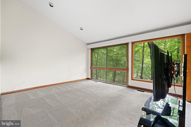 475 Arden, Gulph Mills, PA 19428 - carpeted empty room with lofted ceiling and plenty of natural light