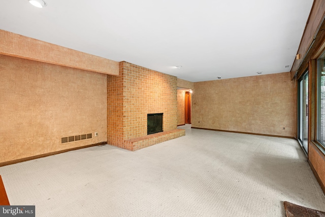 475 Arden, Gulph Mills, PA 19428 - unfurnished living room featuring light colored carpet and a brick fireplace