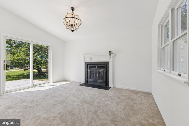6248 Light Point Pl, Columbia, MD 21045 - unfurnished living room featuring a chandelier, carpet, and lofted ceiling