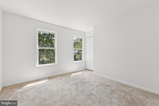 6248 Light Point Pl, Columbia, MD 21045 - carpeted spare room with baseboards