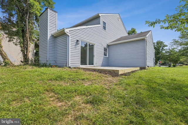 6248 Light Point Pl, Columbia, MD 21045 - back of property with a chimney and a yard
