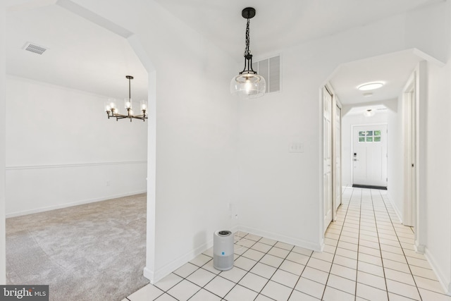 6248 Light Point Pl, Columbia, MD 21045 - hall featuring a chandelier, arched walkways, and light tile patterned floors