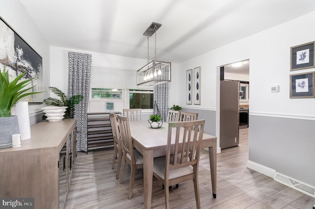 44 Creek Rd, Newville, PA 17241 - dining room featuring light wood-style floors, a chandelier, and baseboards