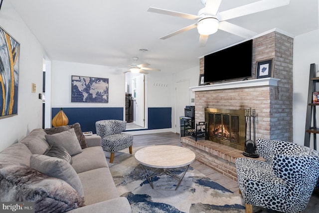 44 Creek Rd, Newville, PA 17241 - living area with a ceiling fan, a fireplace, and wood finished floors