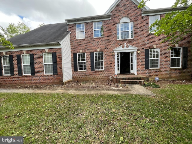 8207 Rison Dr, Brandywine, MD 20613 - view of front of property featuring brick siding and a front yard