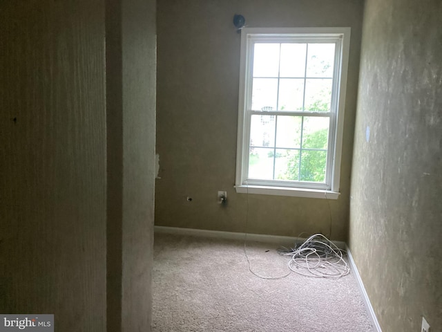8207 Rison Dr, Brandywine, MD 20613 - carpeted empty room with baseboards