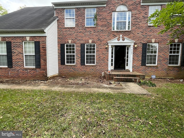 8207 Rison Dr, Brandywine, MD 20613 - view of front of property featuring a front yard and brick siding