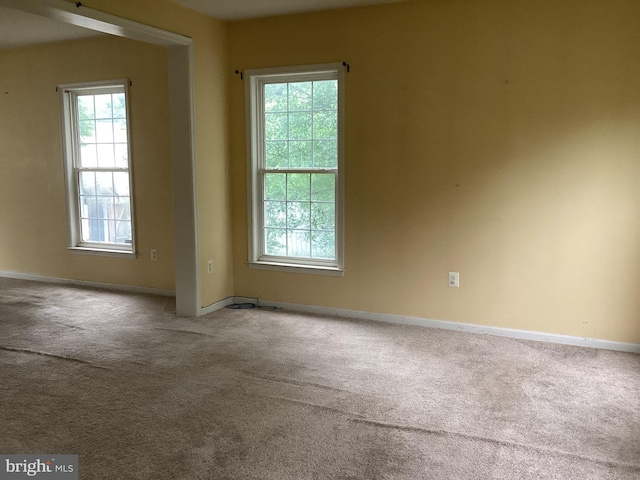 8207 Rison Dr, Brandywine, MD 20613 - empty room featuring carpet floors, healthy amount of natural light, and baseboards