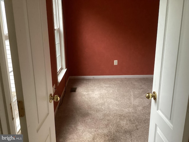 8207 Rison Dr, Brandywine, MD 20613 - carpeted empty room featuring baseboards and healthy amount of natural light