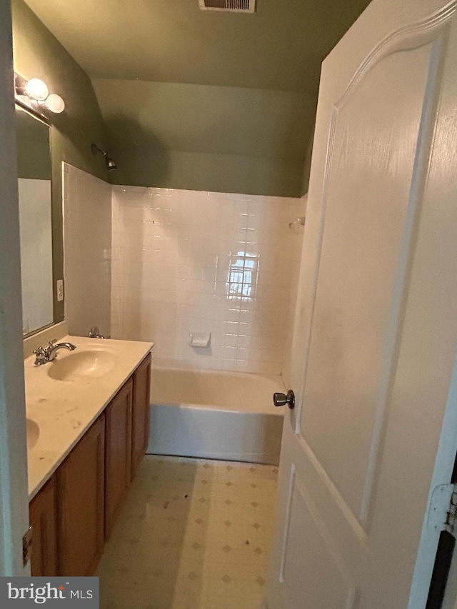 8207 Rison Dr, Brandywine, MD 20613 - bathroom featuring tile patterned floors, shower / bathtub combination, and double vanity