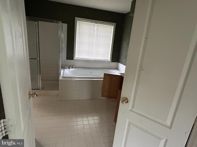 8207 Rison Dr, Brandywine, MD 20613 - full bath with a stall shower, a bath, and tile patterned flooring