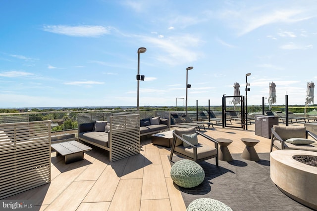 1021 N Garfield St Unit B37, Arlington, VA 22201 - view of patio featuring an outdoor living space with a fire pit